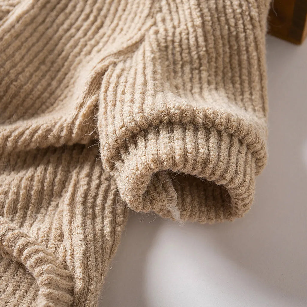 Brown cloth sweater pullover on a small dog, showing casual style and fit.