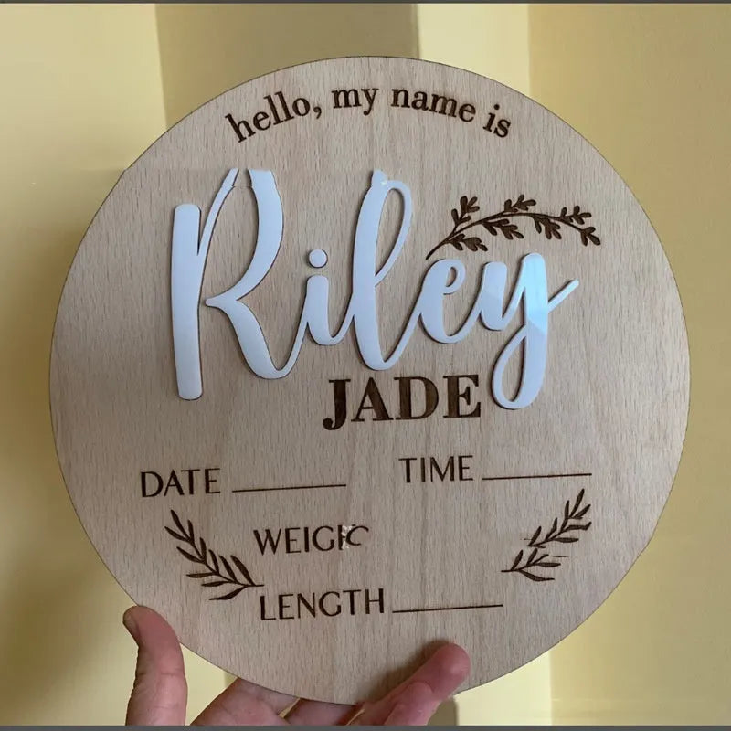 Square wooden baby name label with engraved birth information, 15cm per side.