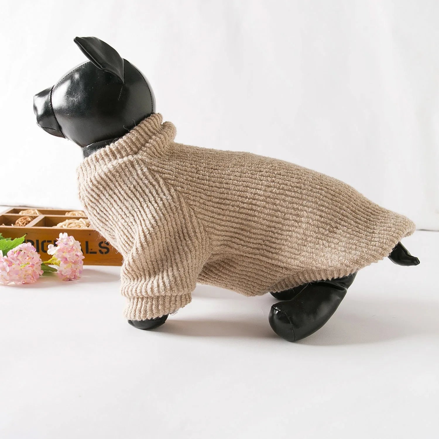 Brown cloth sweater pullover on a small dog, showing casual style and fit.