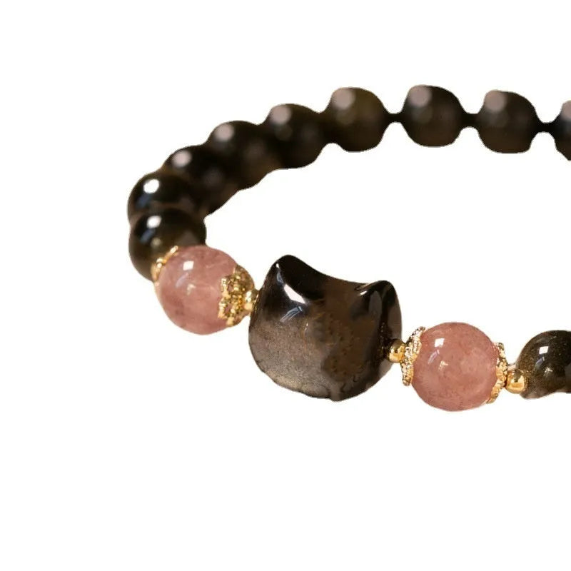 Black obsidian bracelet with 8mm stones and kitty charms on adjustable cord