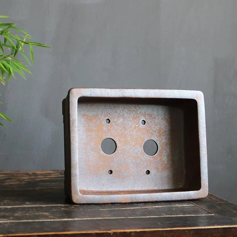 A rectangular purple sand bonsai pot with a textured firewood burning pattern, shown in two sizes.
