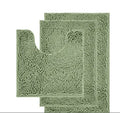 Dark green chenille U-shaped three-piece bathroom toilet carpet set on tiled floor.