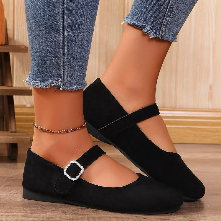 Black canvas women's flat fisherman shoes with low-top design and rubber soles
