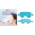 White rechargeable hot and cold compress eye massager device with included eye mask and charging cable on a plain background.