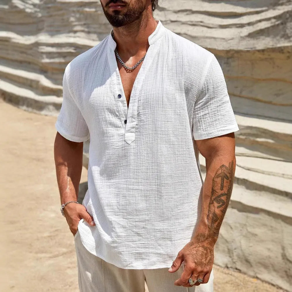 Men's solid colour stand collar short-sleeved shirt in a lightweight fabric.