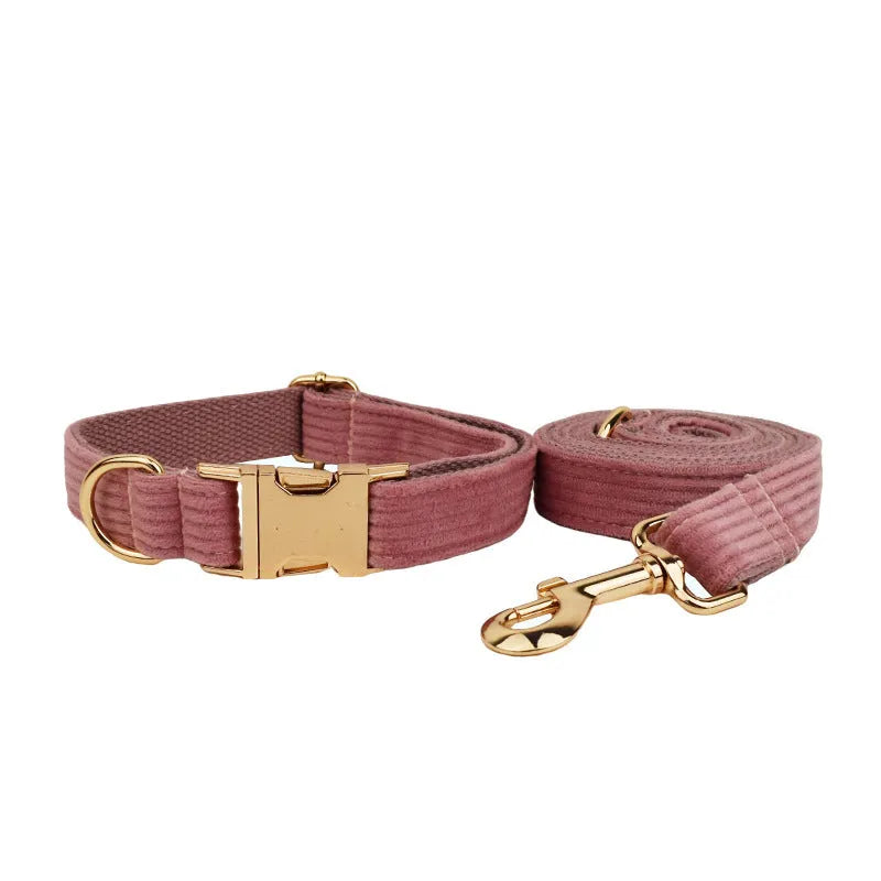 Red corduroy pet collar and matching leash set with optional bow, vest and poop bag accessories