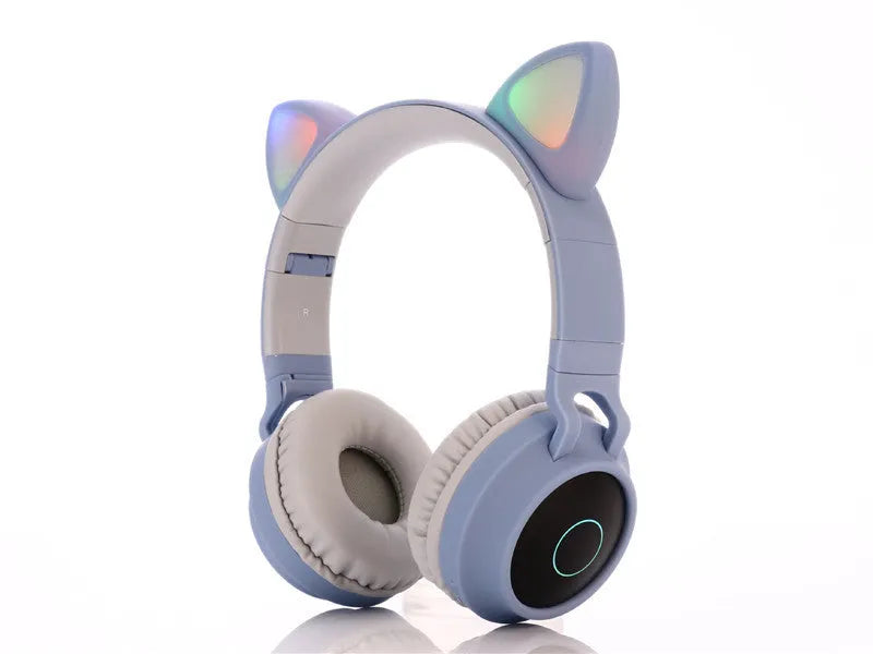 Pink cartoon-style wireless Bluetooth headset with cat ears on the headband, showing bilateral earcups.