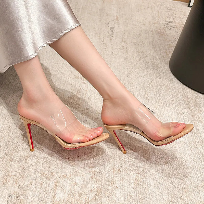Transparent women's ankle-strap stiletto sandals with 8cm heel in black colour