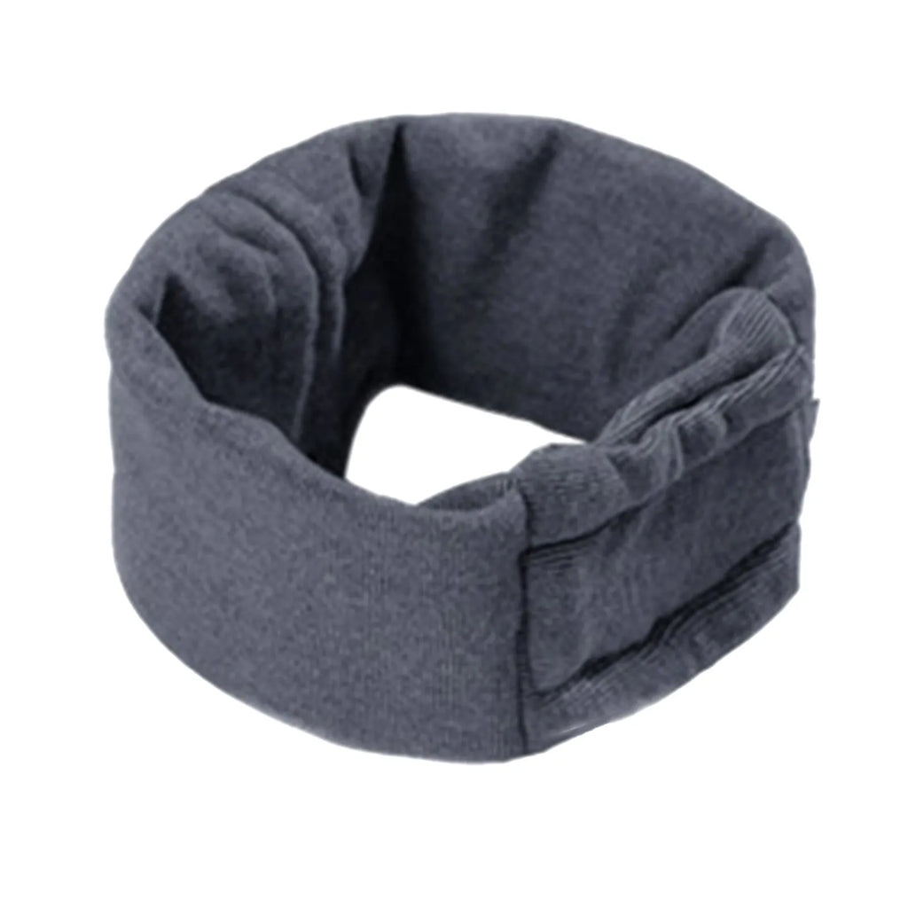 Dog wearing purple noise reduction hoodie with ear wraps and head cover