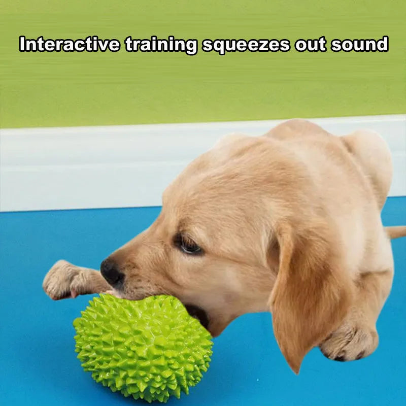 Beige, green, and yellow durian-shaped dog chew toy with raised bristles for teeth cleaning.