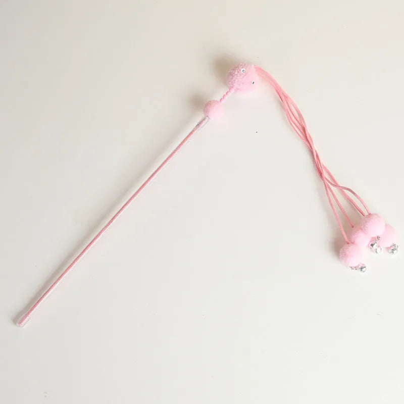 Flexible cat wand toy with colourful tassel attachment for interactive indoor play sessions