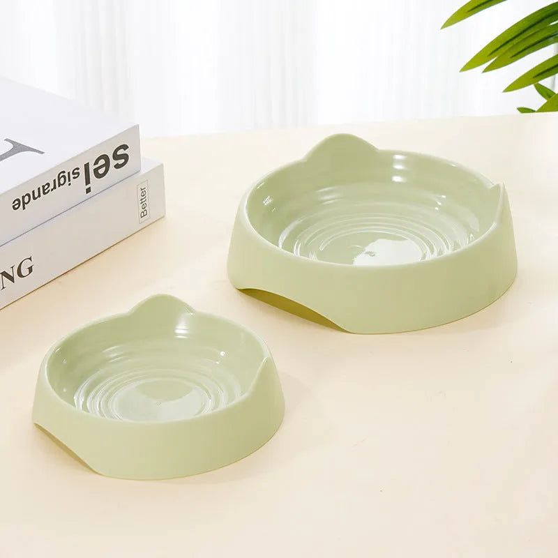 Ceramic dog slow feeder puzzle bowl in blue, green, or pink colours shown in two size options