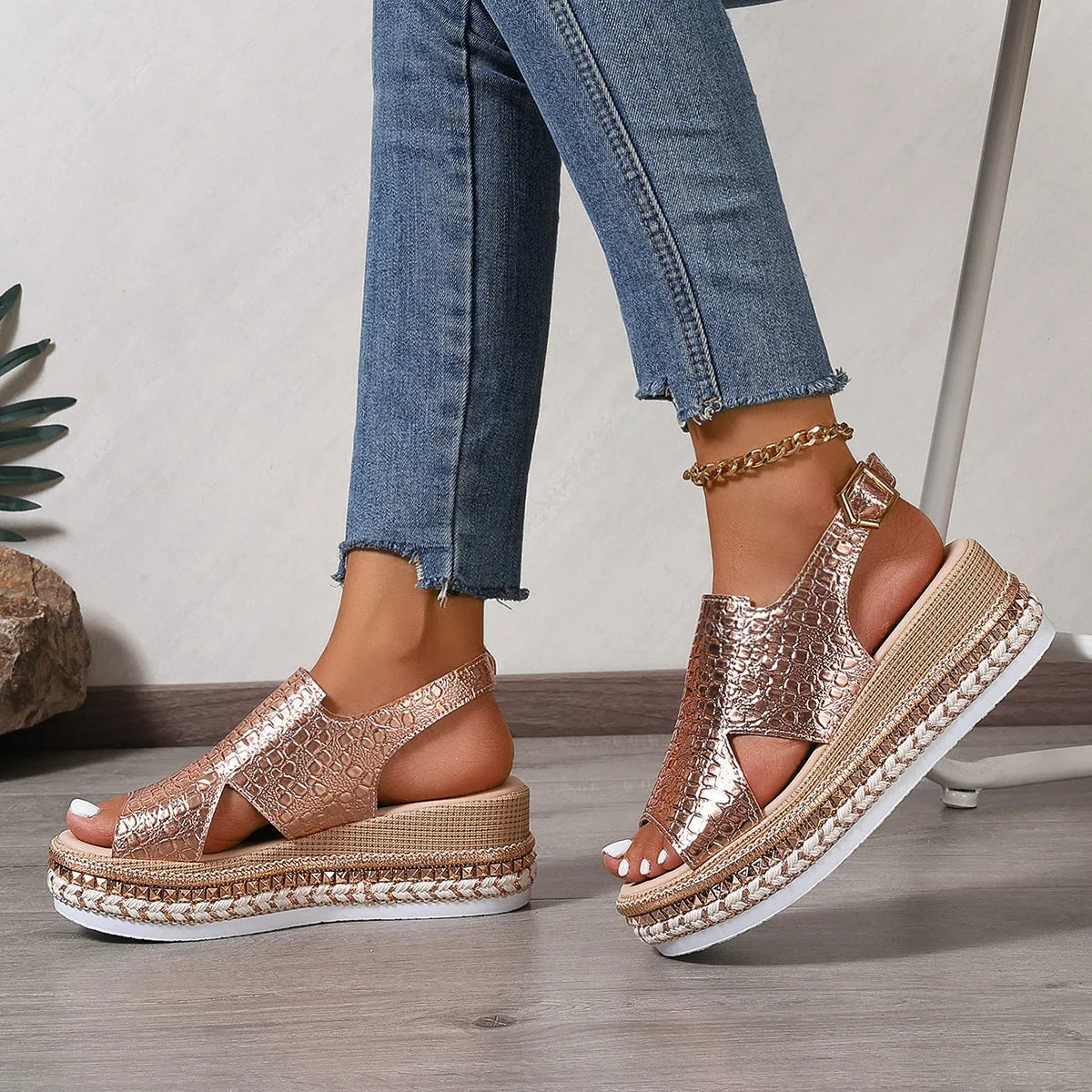 Gold women's Roman sandals with round toe, hollow-out design, and adjustable ankle buckle