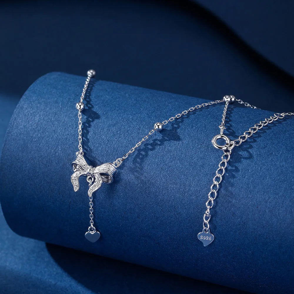 S925 silver butterfly heart clavicle chain necklace with adjustable O-ring chain and bow detailing
