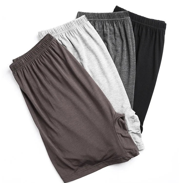 Solid colour men's modal boxer shorts on a white background, showing high-waist design