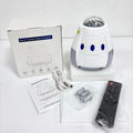 USB space capsule projector lamp showing starry galaxy projection effect with remote control