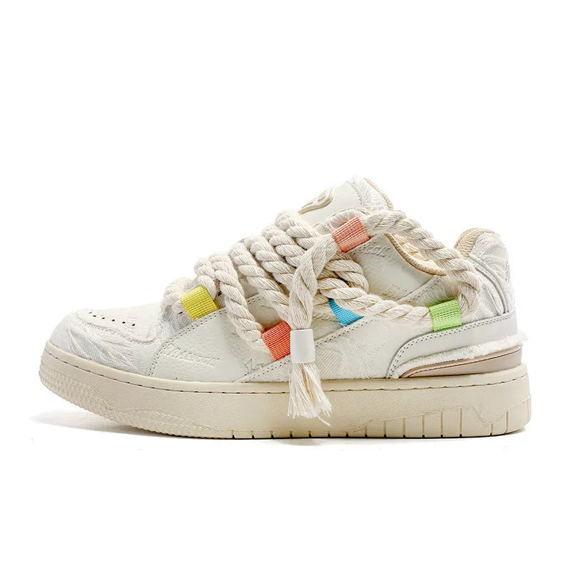 Creamy white retro skateboard shoes with old damage lace design and low-top platform profile