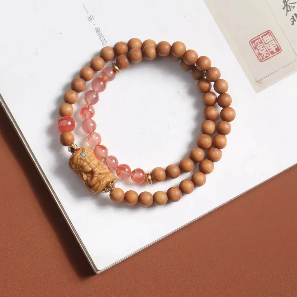 Brown sandalwood bracelet with South Red double circle design and 6mm round beads