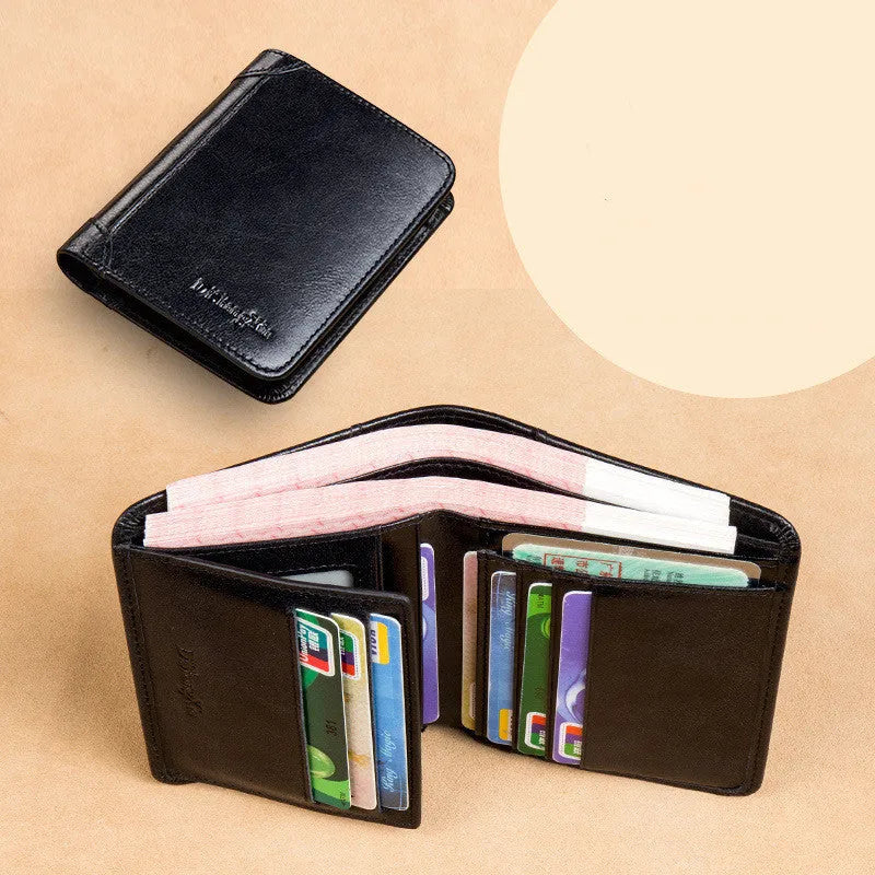 Men's black leather RFID blocking wallet open to show card slots, ID window, and coin pocket.