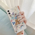 Bear chain charm on a TPU protective case for iPhone, featuring a Japanese Korean cartoon style design.