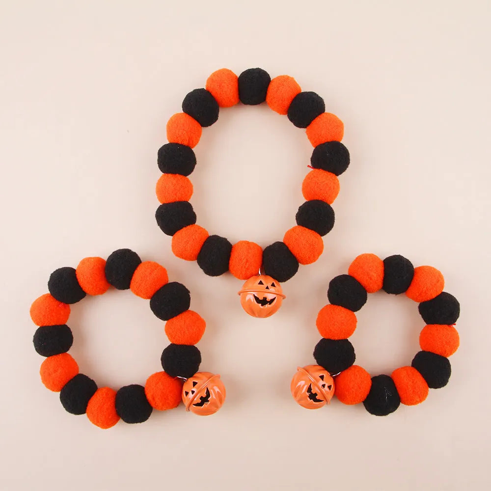 Halloween cat collar with naughty pumpkin design on adjustable nylon webbing in three sizes