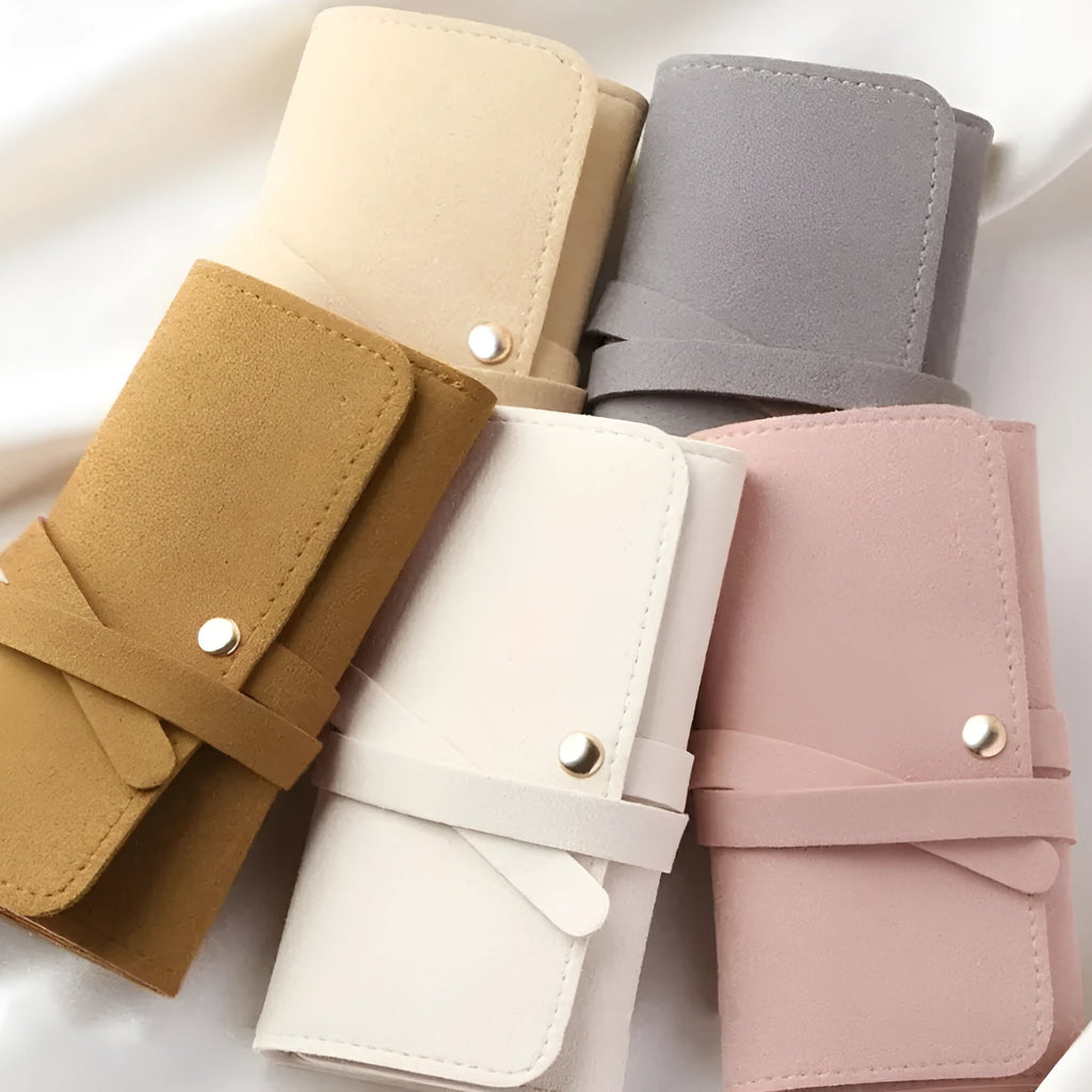 Brown PU leather jewellery storage bag with microfiber lining, measuring 12cm by 12cm.