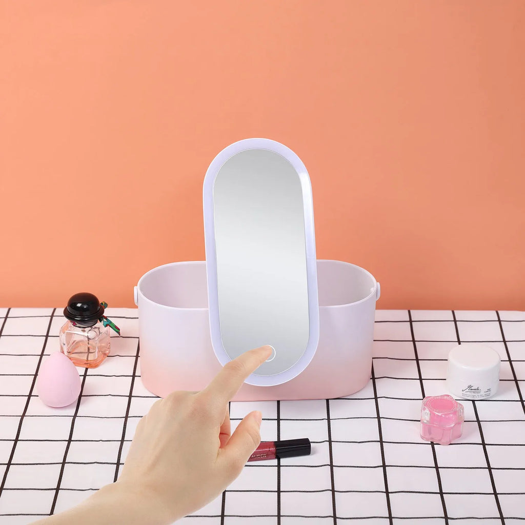 Pink gradient portable LED makeup mirror and storage organiser box with USB port.