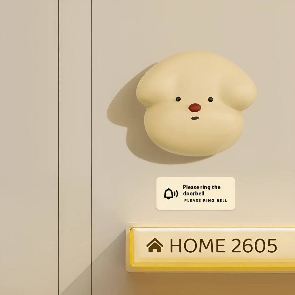 Wireless plug-in doorbell in milky yellow or white colour for household use