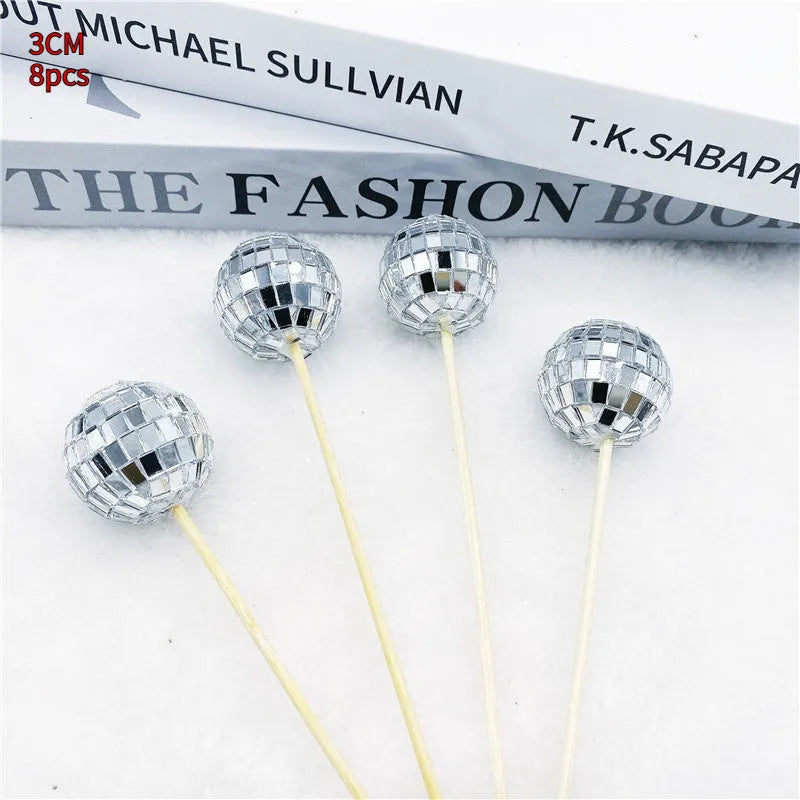 Glass disco ball cake decoration on wooden stick in various sizes for birthday party cakes