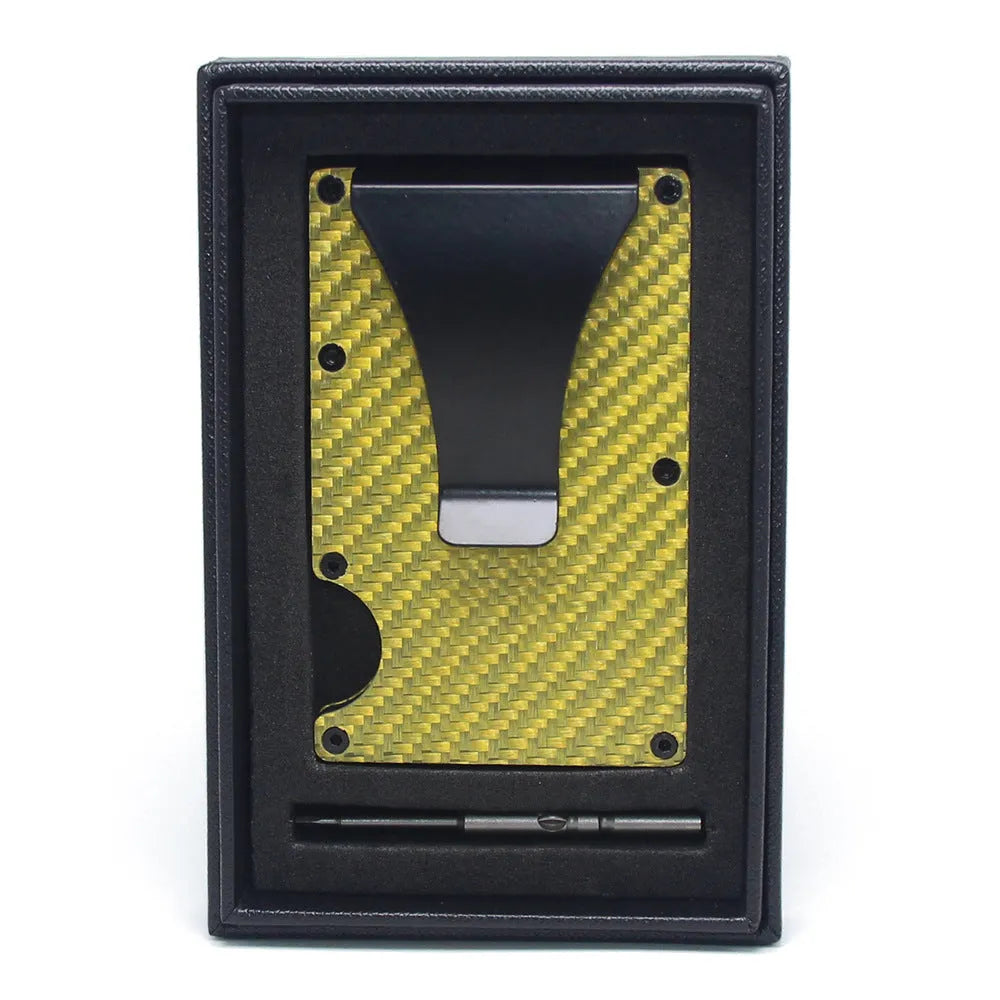 Slim black carbon fibre card holder wallet with geometric design on a gift box.