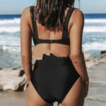 Women's solid colour polyester bikini set showing top and pants in black