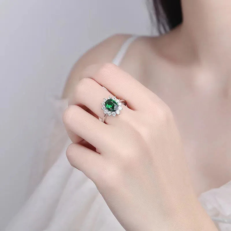 Electroplated copper women's ring with flower design and inlaid zirconium stones in three colour options.