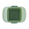 Green handheld multi-functional vegetable chopper with stainless steel blades for onions and potatoes