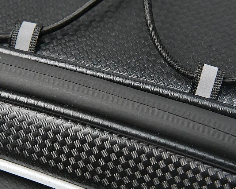 Black waterproof PU leather bicycle rack bag mounted on a bike rear rack, showing its 8-litre capacity.