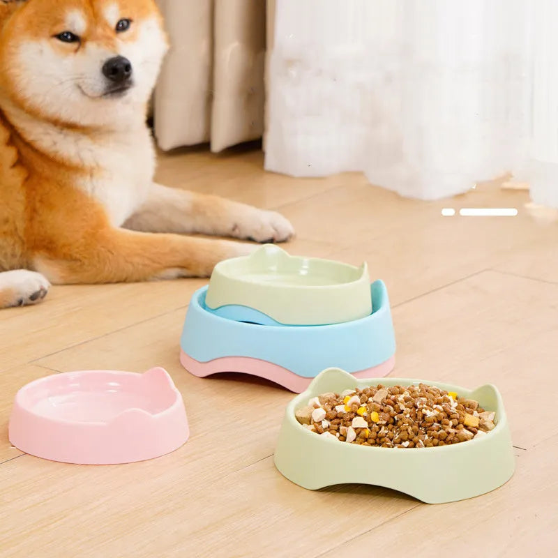 Ceramic dog slow feeder puzzle bowl in blue, green, or pink colours shown in two size options