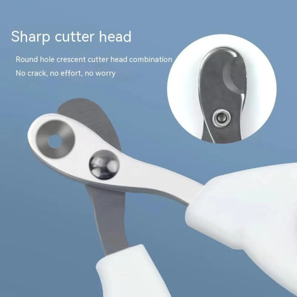 Blue pet nail clippers with a circular guide hole and cushioned handles on a white surface.