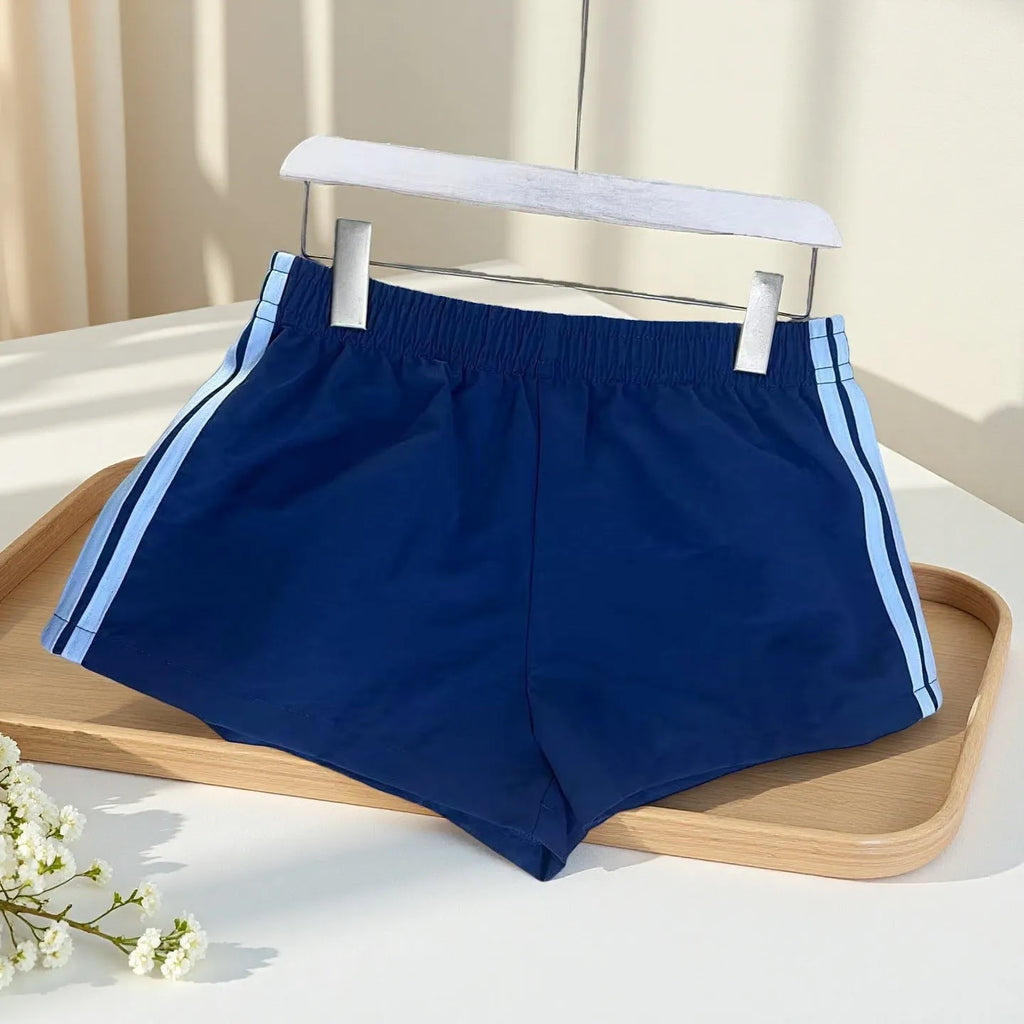 Men's navy blue nylon sport shorts with high-waist elastic waistband