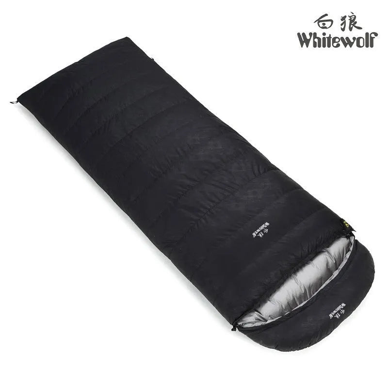 Black outdoor sleeping bag filled with white goose down and made from tear-resistant nylon.
