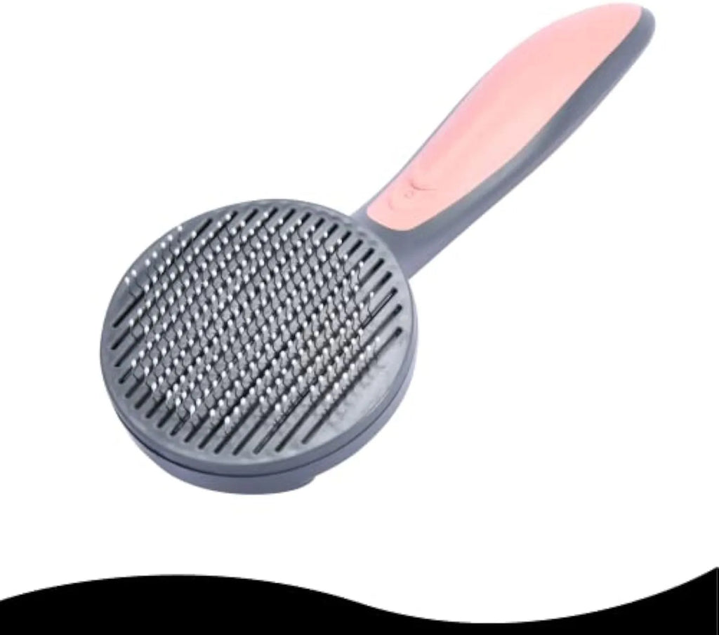 Grey self-cleaning slicker brush for cats and dogs with massaging bristle tips on a non-slip handle.