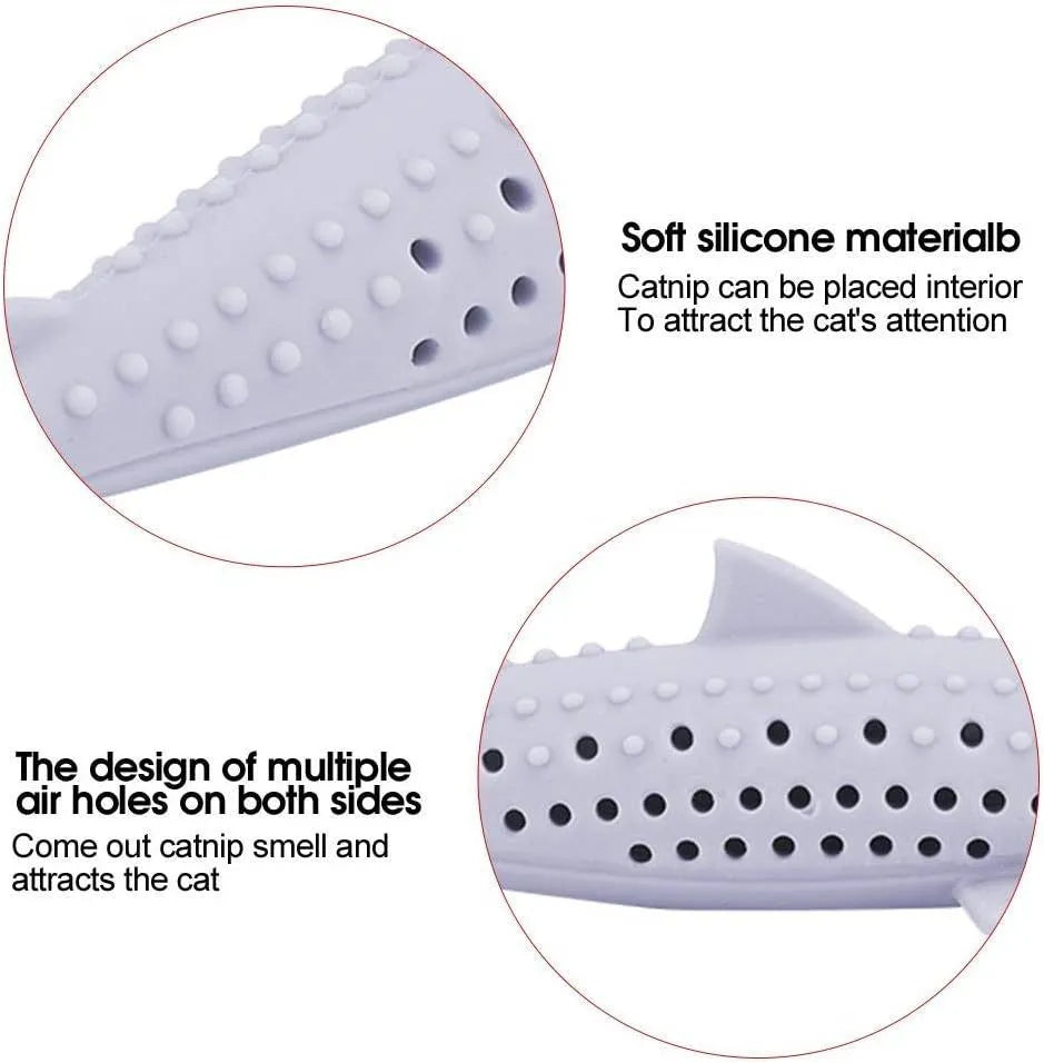 Green silicone fish-shaped chew toy for cats on a white background, showing breathable side holes.