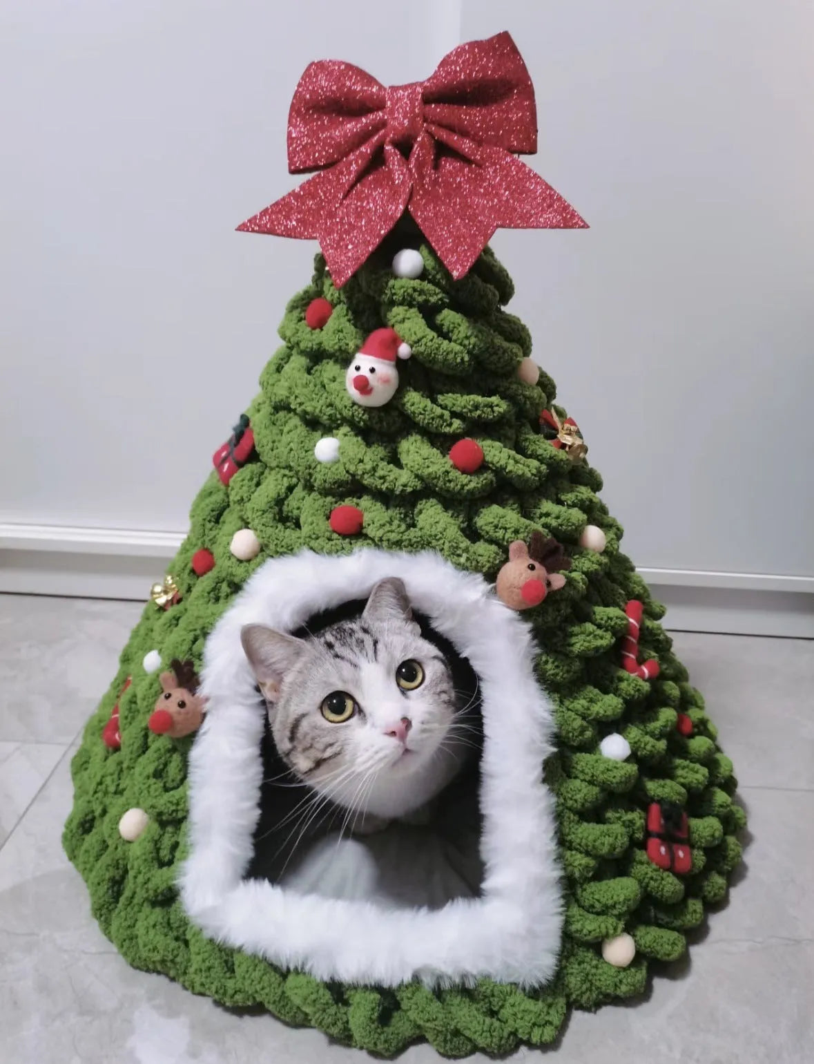 Grey cone-shaped felt cat house measuring 50cm wide with enclosed tent design
