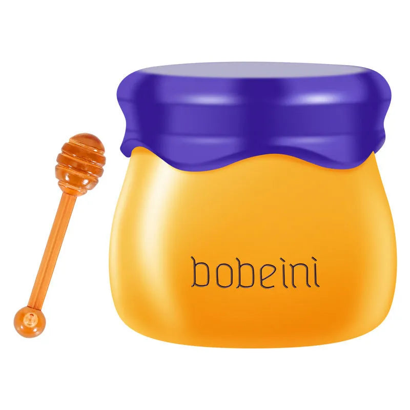 Vaseline moisturising lip balm pot in 9g size with a small brush applicator.