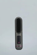 Portable USB-C rechargeable negative ion hair comb in blue, grey, or white.