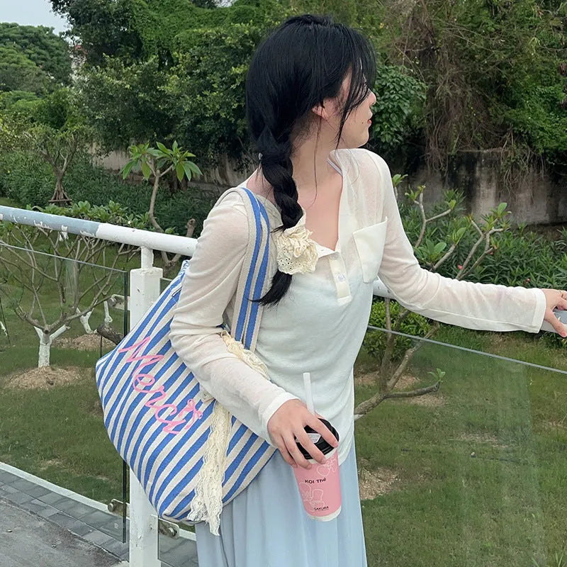 Blue and white striped cotton canvas bag with printed letters in a fresh, sweet style.