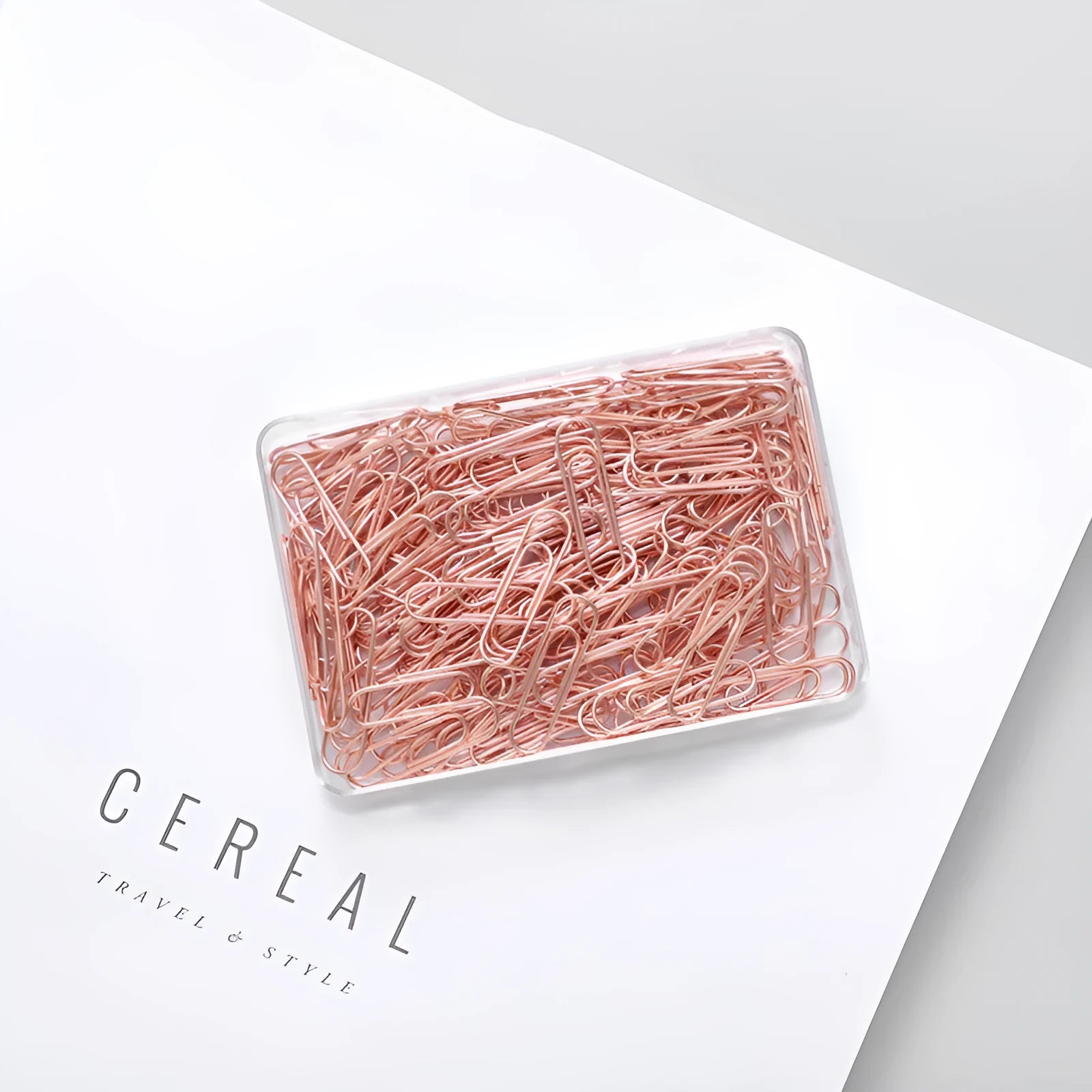 Rose gold heart-shaped paper clips with steel core construction measuring 28mm each