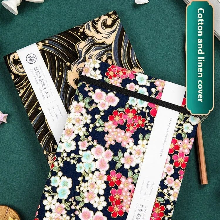 Feiluniao handmade watercolour notebook with fabric cover showing floral design, 185mm length