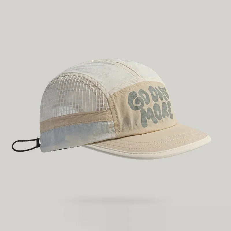 Gradient coloured quick-drying mesh baseball cap with dome crown and printed detail.