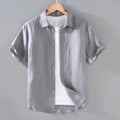 Men's linen short-sleeved cardigan shirt in regular fit showing colour options and thin fabric texture
