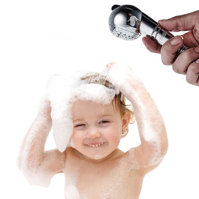 Silver coloured compact handheld shower head for gentle pet and baby baths.