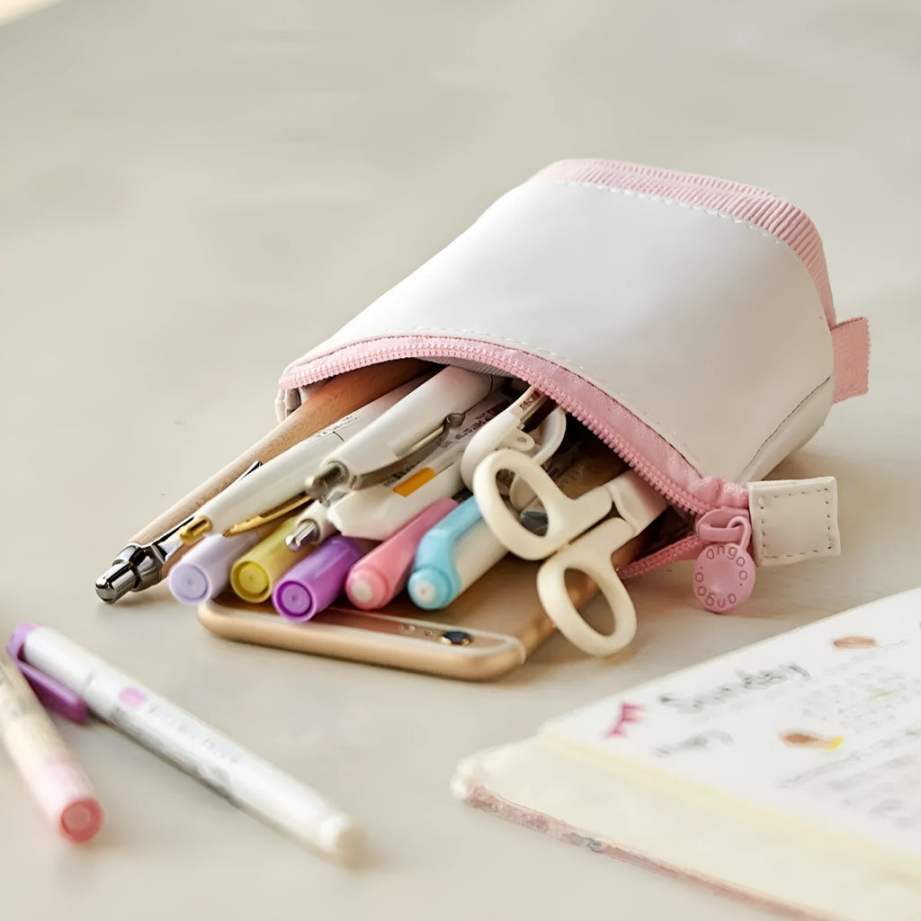 Purple PU corduroy drop-down telescopic stationery case on a desk
